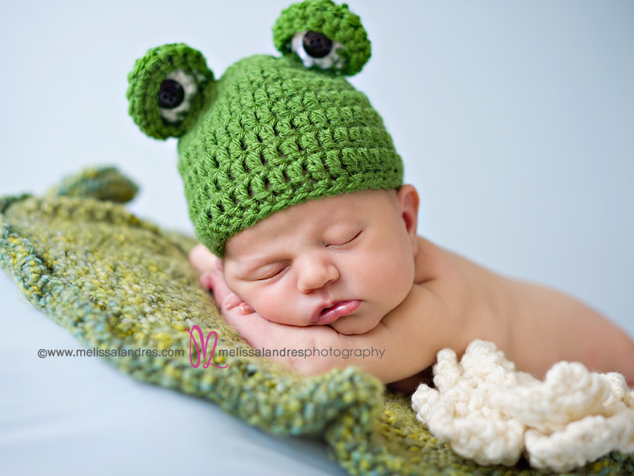 baby on knit lily pad