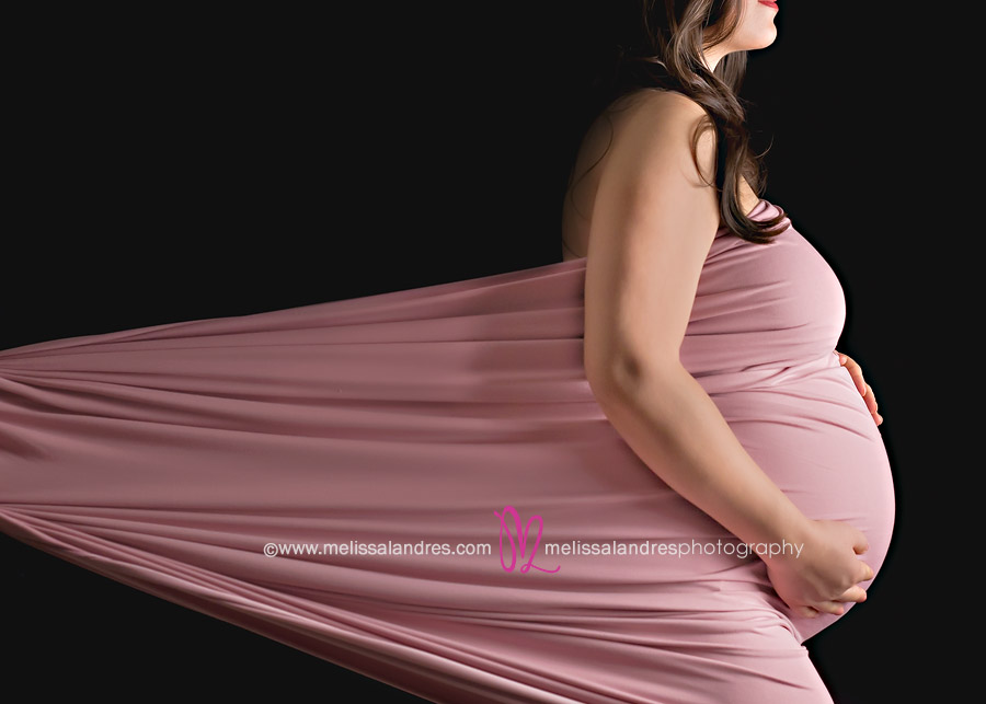 pink maternity stretch wrap pose by Palm Desert photographer Melissa Landres