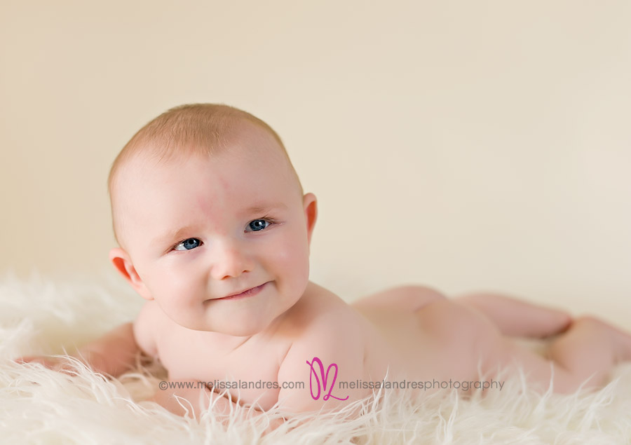 cute natural baby pictures on white fur rug