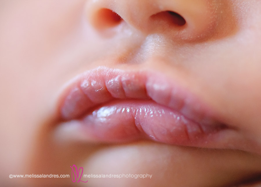 Close up of cute pouty baby lips by photographer Melissa Landres