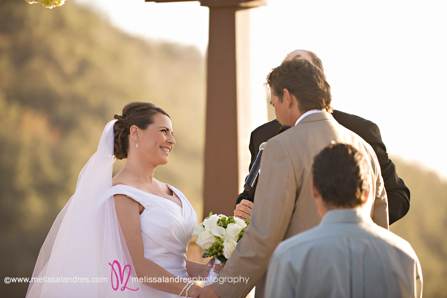Bride and groom at the altar by professional La Quinta wedding photographer Melissa Landres