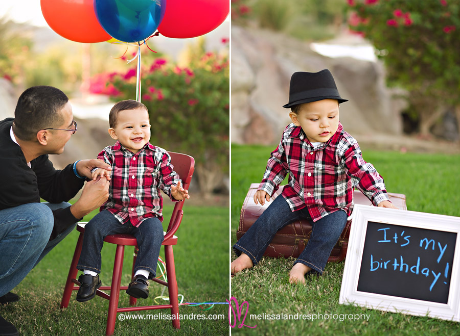 baby on red chair with balloons and chalkboard sign 
