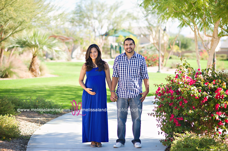 Maternity photo session in the park, stunning blue maxi dress outdoors