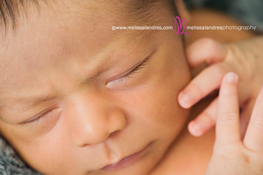 Newborn baby close up photos of baby's tiny nose, lips, and eyelashes