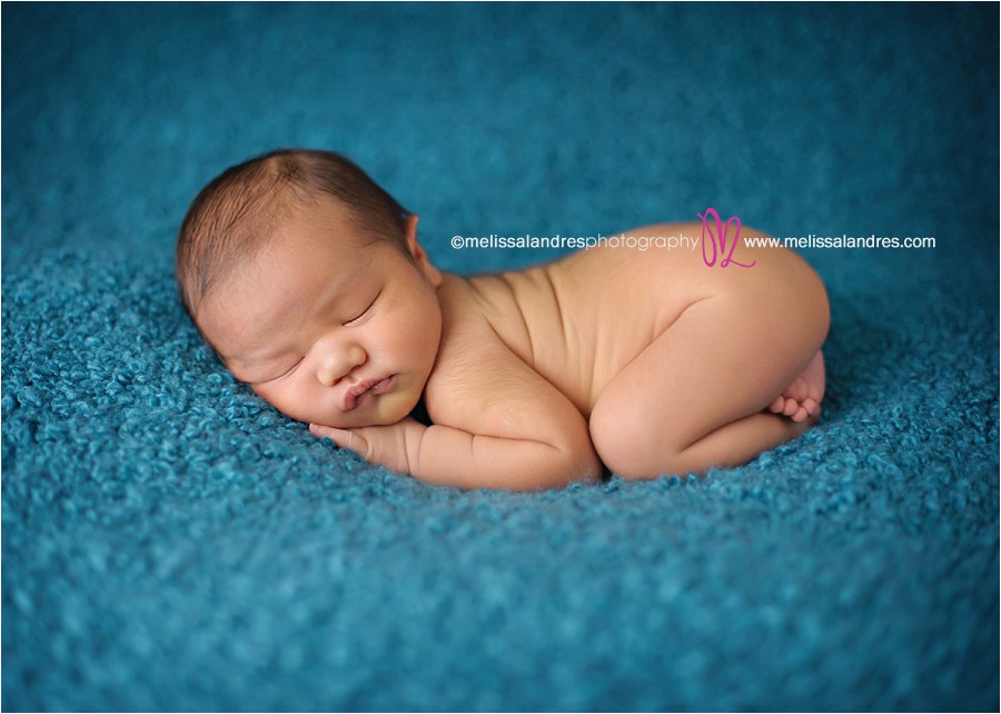 newborn baby sleeping pose, blue background for baby portraits