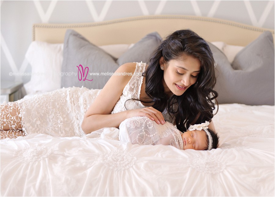 professional newborn family photos at home, mom adores baby girl