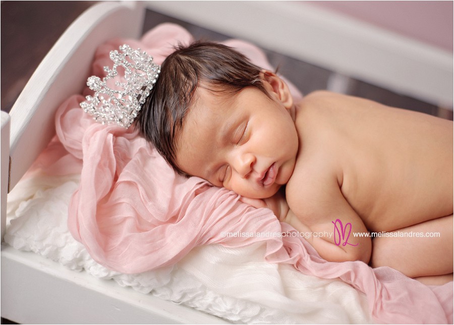princess baby on tiny baby bed prop, pink and white with gorgeous rhinestone crown, baby bling