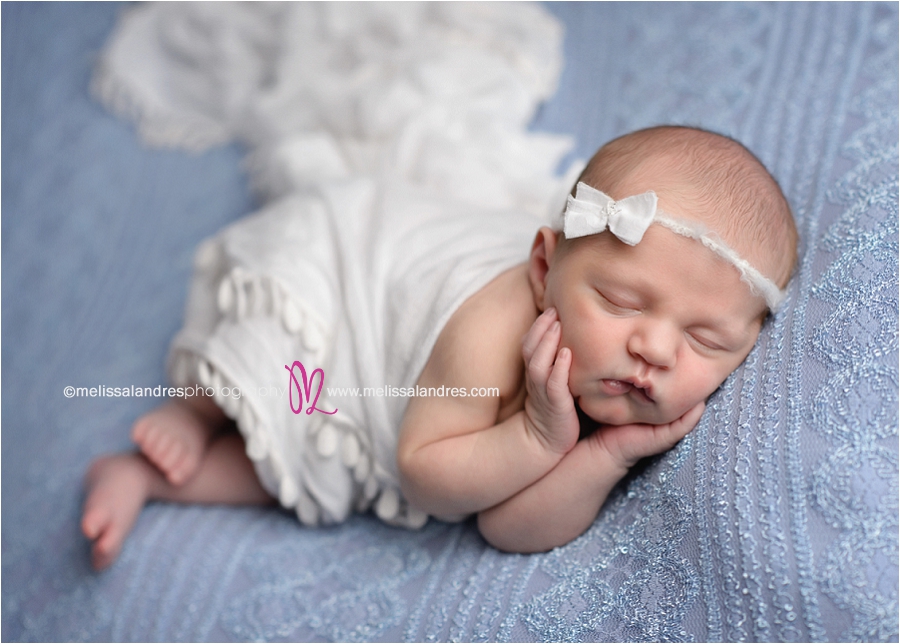 newborn baby girl on soft blue lace backdrop, angelic baby pics, baby photos with lace and headbands, baby in a bucket, best Palm Desert baby pictures by Melissa Landres photography